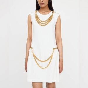 Luxury brand Mochino Elegant Gold Chain hardware on the dress